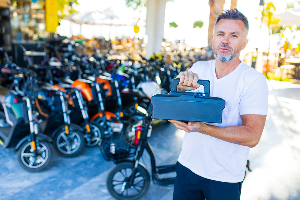 Battery Charging Process and Electric Scooter Rental Store or Parking